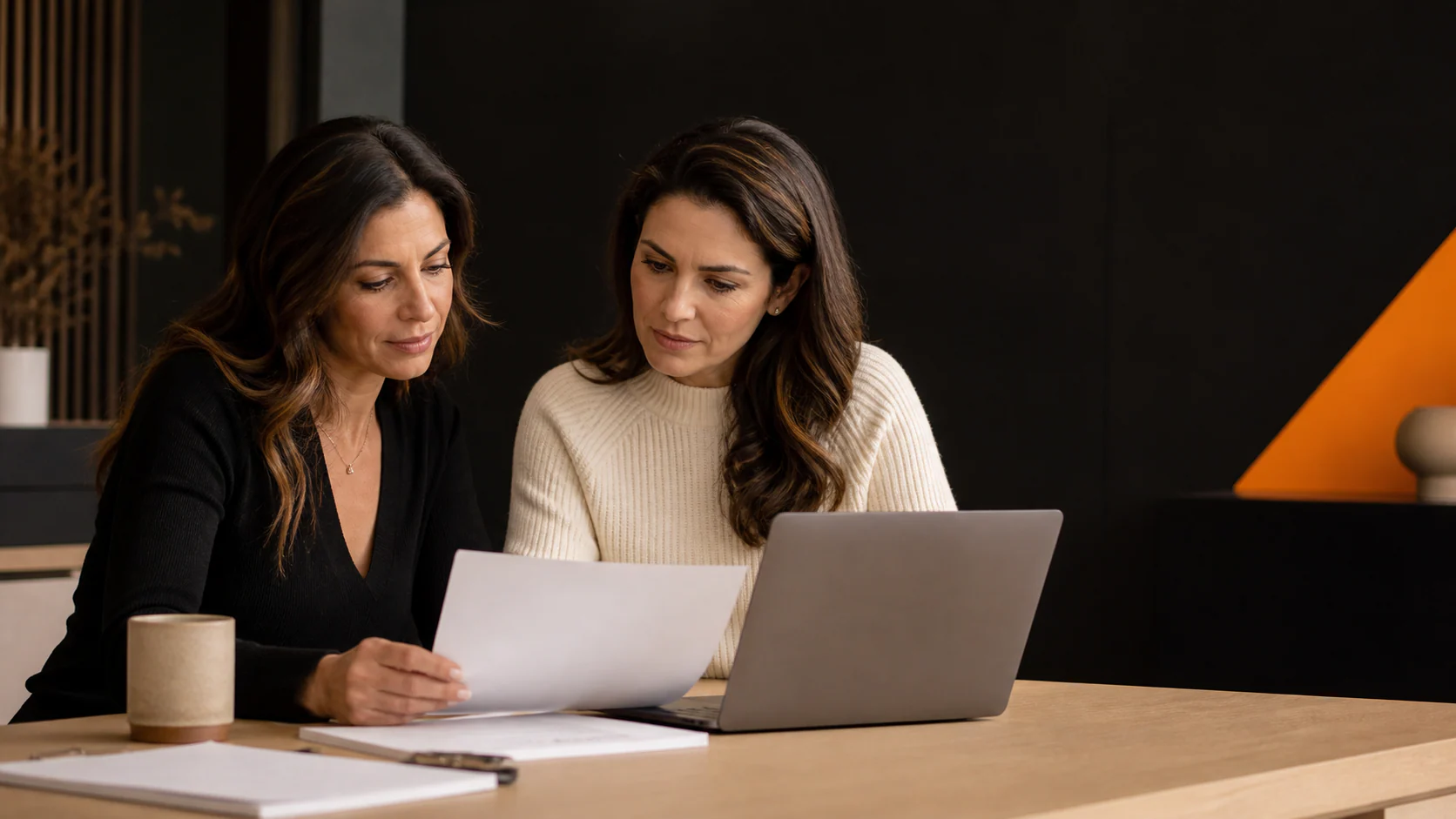 Local health business owner and communications specialist reviewing a press release